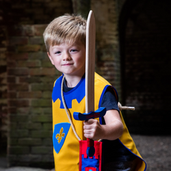 child wearing Children's medieval tabard in yellow and blue