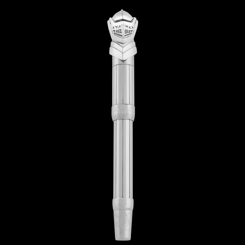 Silver pen with decorative top on a black background