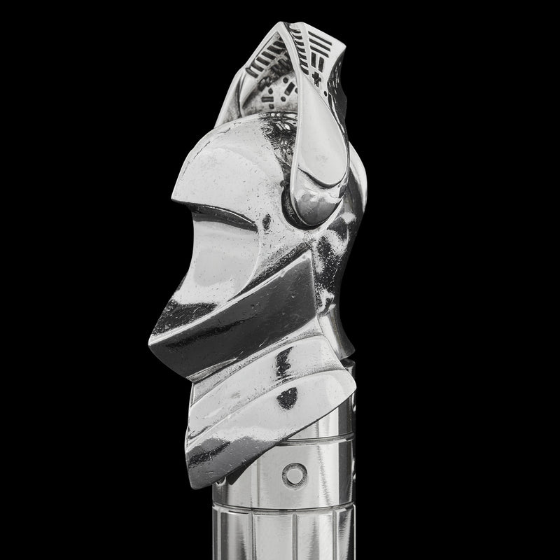 Chrome pen cap with helmet visor up on a black background