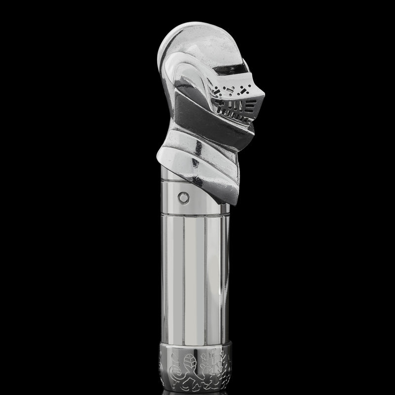 pen cap shaped like henry viii helmet facing right hand side on black background