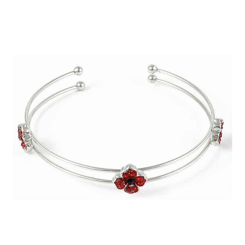 Silver bangle with three vibrant red enamel poppies adorning it