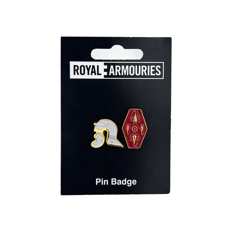Roman helmet and shild pin badges on black Royal Armouries branded board on white background