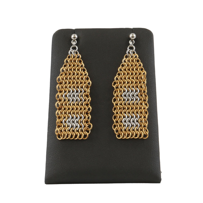 Pair of chainmaille earrings on a black display stand against a white  background