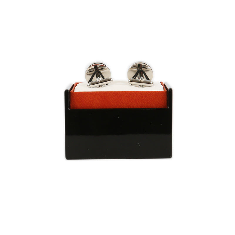 back view of roman mosaic spiral cufflinks in black and orange branded presentation box
