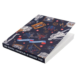 Notebook with decorative cover featuring historical designs on a white background