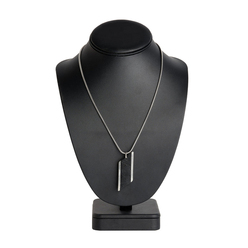 diamond feature snake chain necklace with a black leather inlay on display stand