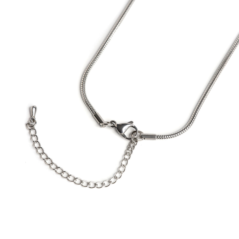 snake chain necklace with pewter and leather features lobster clasp