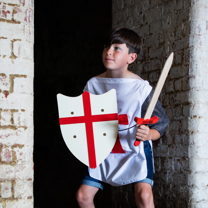Child dressed as knigh holding Childrens St. Georges Cross wooden shield