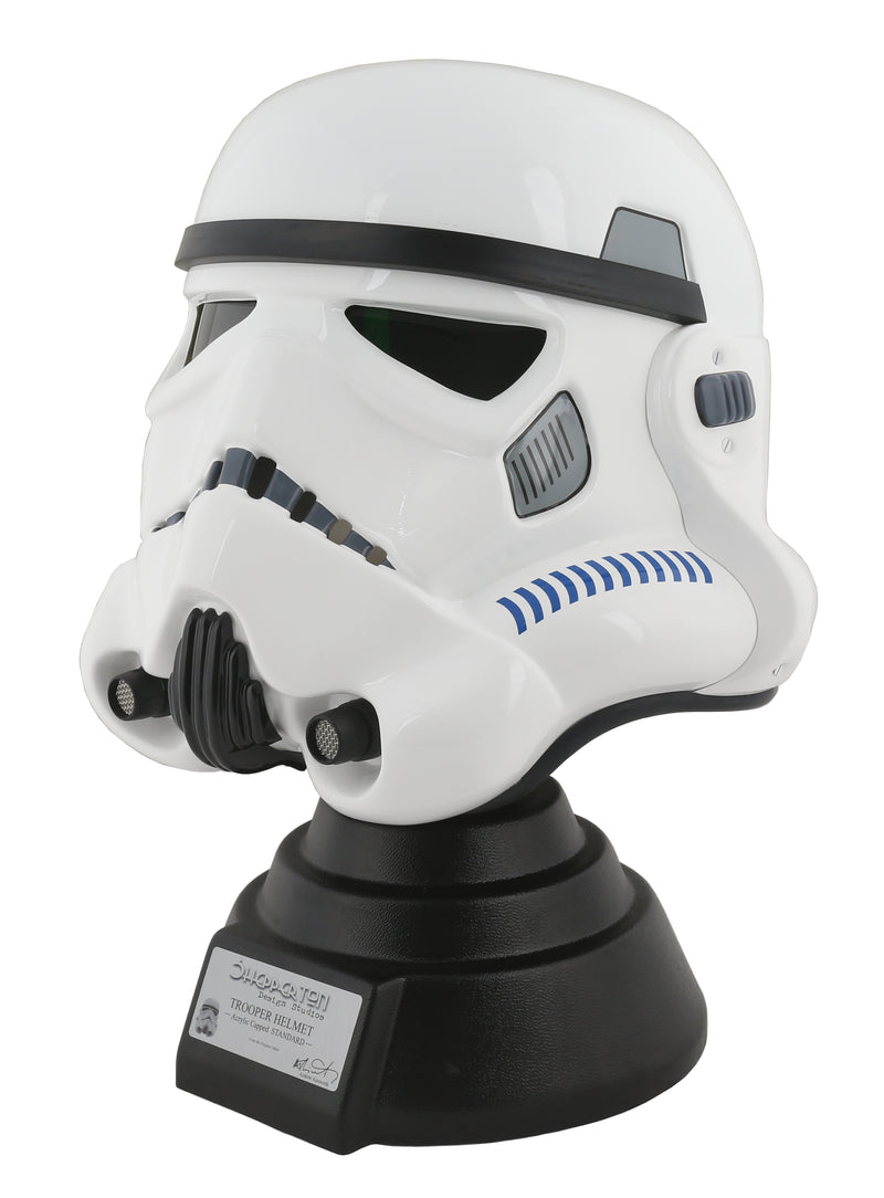 Stormtrooper helmet on black display stand with silver plaque left side view