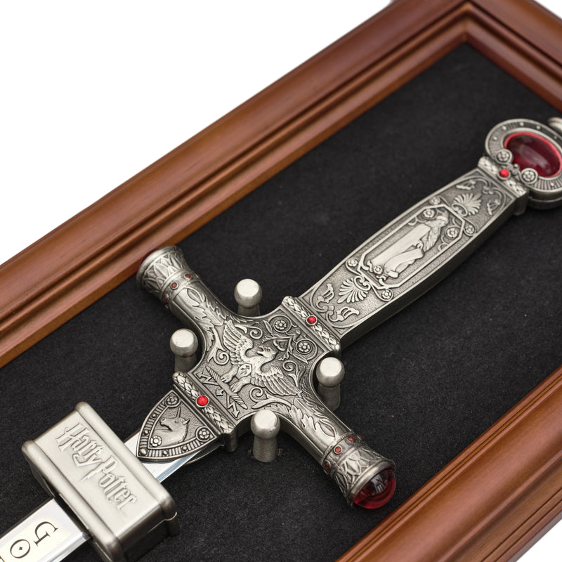 Sword of Godric Gryffindor full scale replica displayed on wooden plaque- hilt detail on plaque