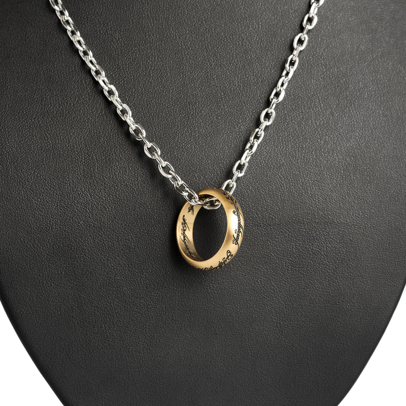 close up detail of the one ring necklace on a black display stand