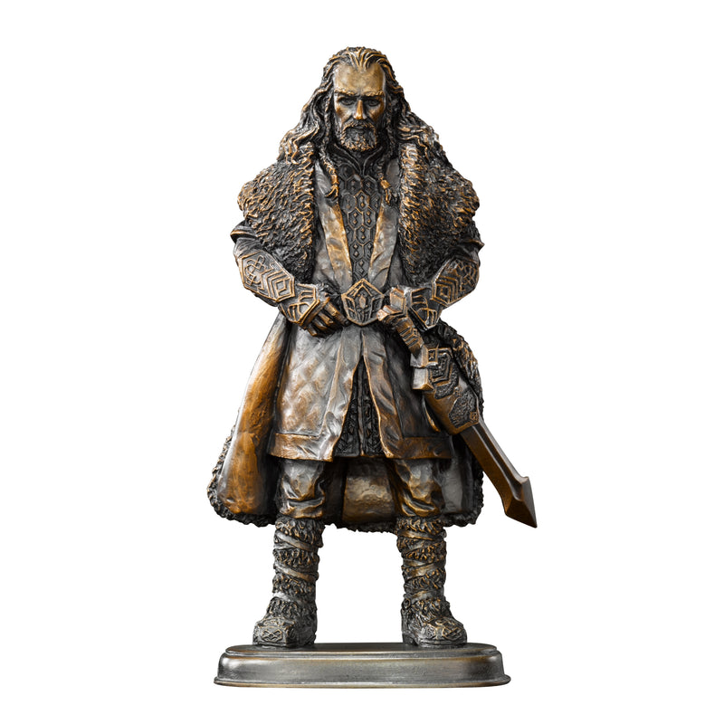 Statue of a character in a detailed costume on a white background