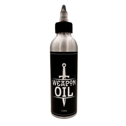 metal weapon oil bottle with a black label