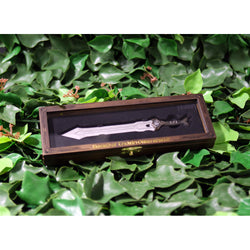 Thorin Oakenshield’s regal sword replica letter opener in wooden display cas on a bed of ivy